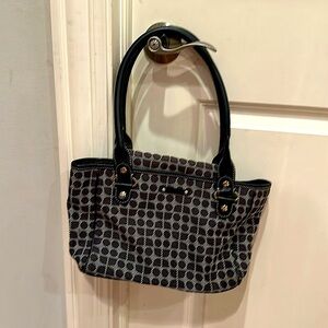 Fun Black and White Kate Spade purse.  Gently used with overall good condition